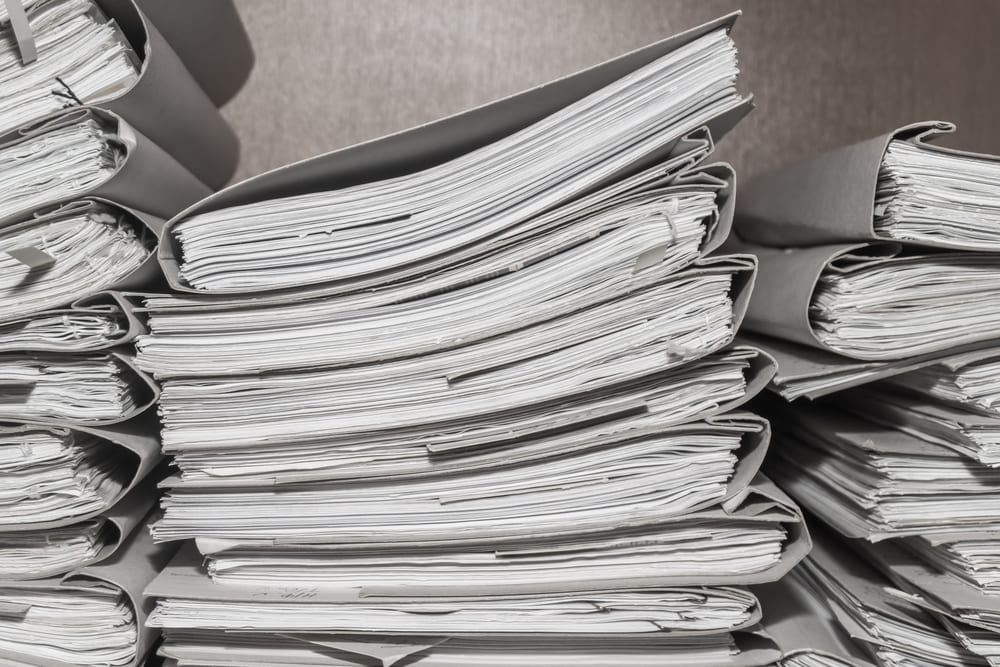 A stack of documents that could be served